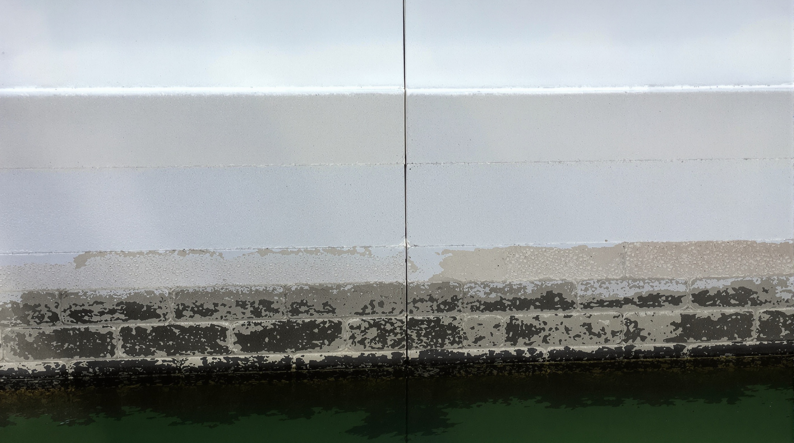 Close-up of seawall cap and tieback anchor — South Florida waterfront protection